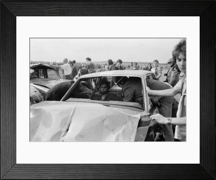 Framed Print : Stunt driver Mick Stirrups comes down to earth with a crash after tying to leap over Framed Print : Stunt driver Mick Stirrups comes down to earth with a crash after tying to leap over