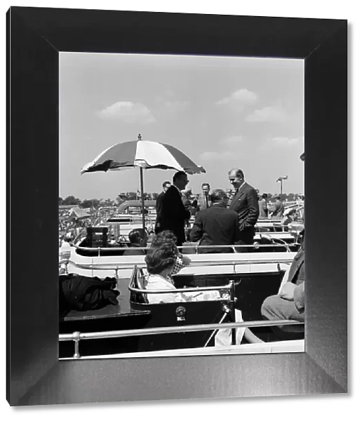 Derby Day at Epsom. Pictured, a sunshade over the bar on a bus. 3rd June 1959