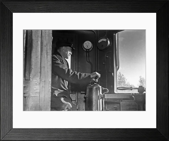 Framed Print : Driver of a Southern Railways Electric Multiple Unit train at Rayners Park Station Framed Print : Driver of a Southern Railways Electric Multiple Unit train at Rayners Park Station