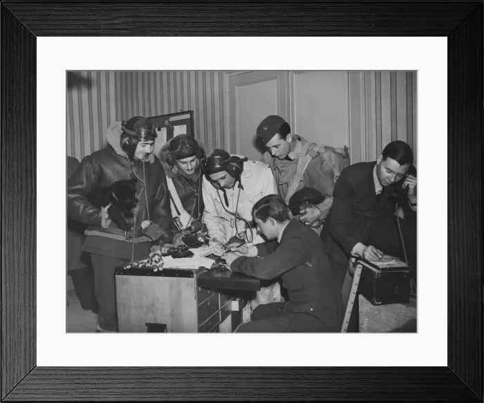 Framed Print : Bomber crews receiving instructions in their squadron flight office, some where in France Framed Print : Bomber crews receiving instructions in their squadron flight office, some where in France