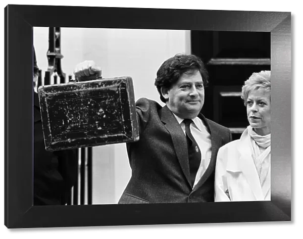 Chancellor of the Exchequer Nigel Lawson outside 11 Downing Street with his wife Therese
