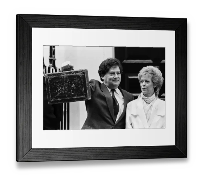 Framed Print : Chancellor of the Exchequer Nigel Lawson outside 11 Downing Street with his wife Therese