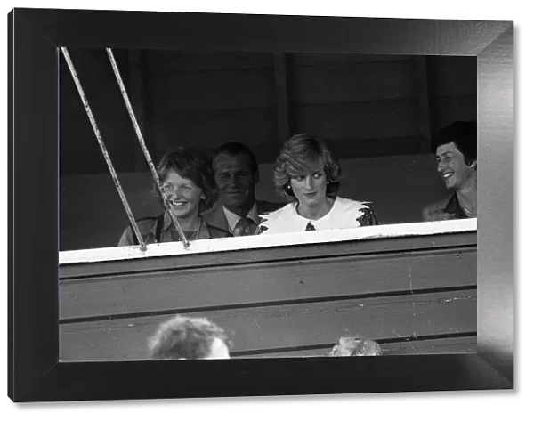 Diana, Princess of Wales watches her husband playing polo during a visit Auckland