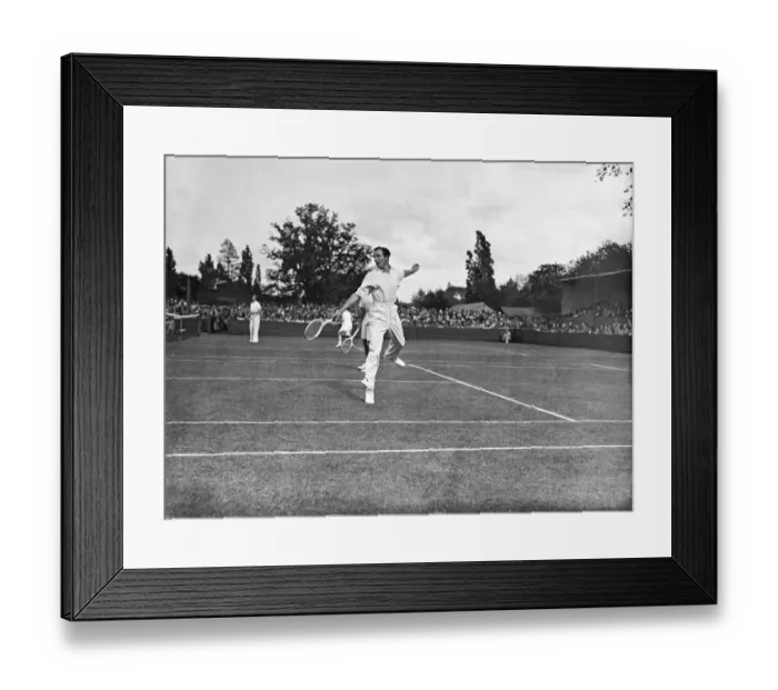 Framed Print : Fred Perry playing doubles lawn tennis. It is not clear as to the actual