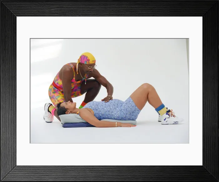 Framed Print : Mr Motivator Derek Evans and pregnant wife Sandra Palmer doing special exercises for