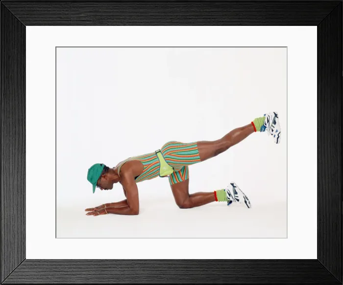 Framed Print : Mr Motivator Derek Evans performing floor exercises. 3rd September 1993