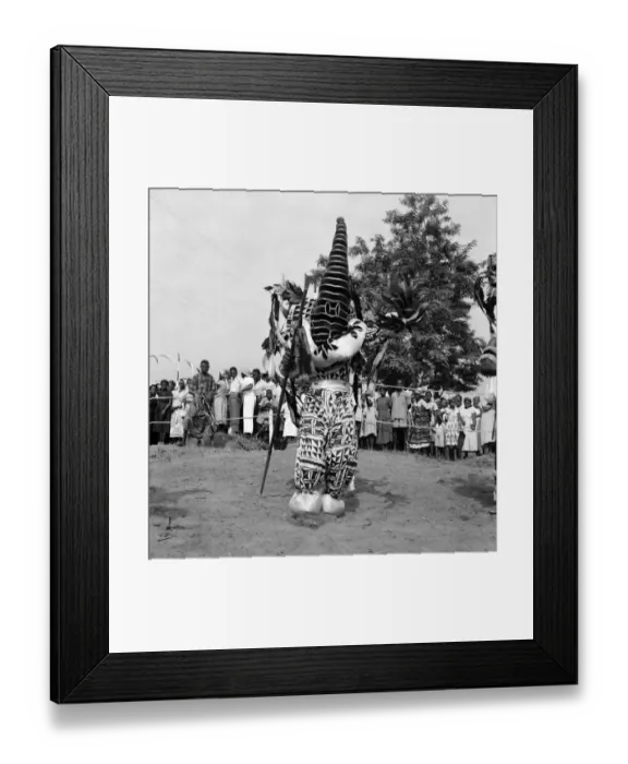 Framed Print : A Nigerian dancer who is performing in traditional costume for Queen Elizabeth II