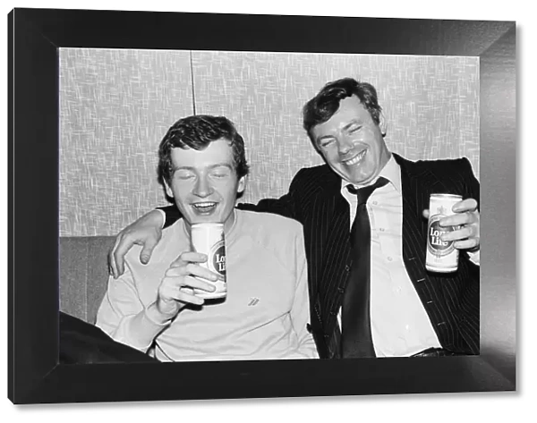 Snooker player Steve Davis having beer with a fan. 8th June 1981