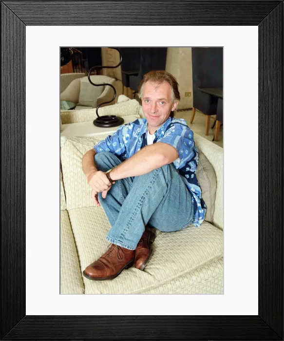 Framed Print : Actor and comedian, Rik Mayall, pictured at home four months after his horrific quad bike