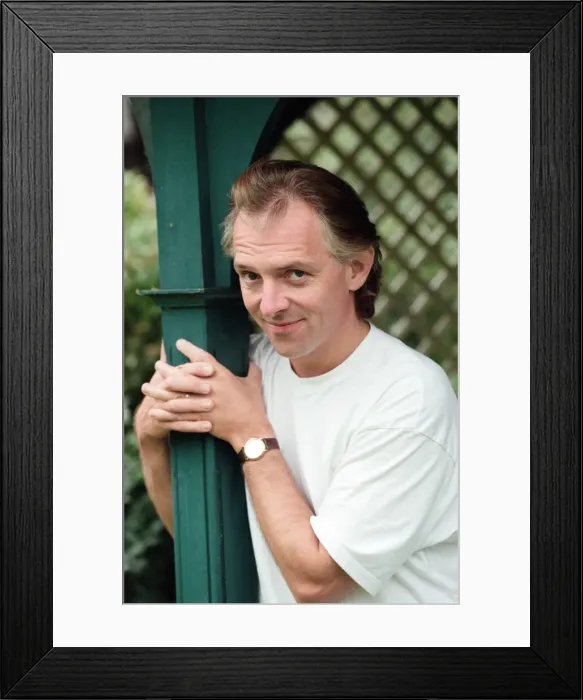 Framed Print : Actor and comedian, Rik Mayall, pictured at home four months after his horrific quad bike