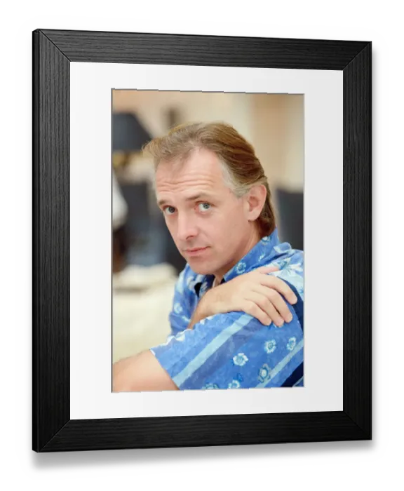Framed Print : Actor and comedian, Rik Mayall, pictured at home four months after his horrific quad bike