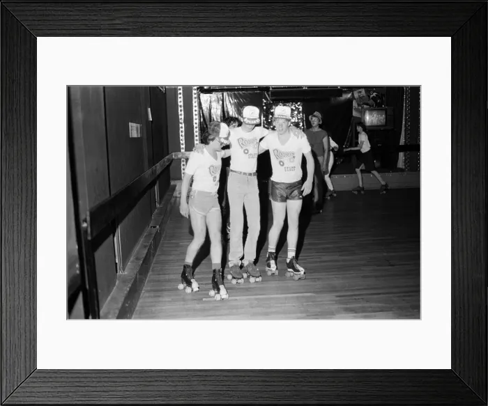 Framed Print : Young holidaymakers at the roller disco at the James Corrigan seafront amusement arcade
