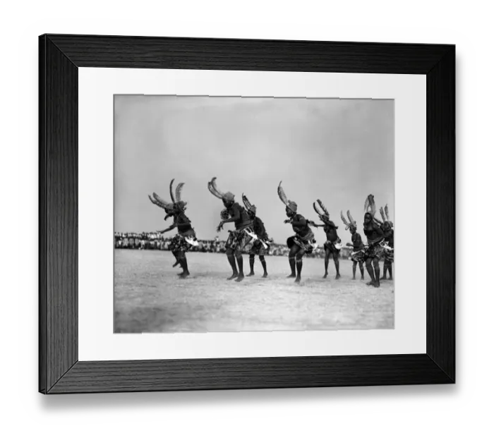 Framed Print : Nigerian women, wearing feathered headdresses and traditional costumes Framed Print : Nigerian women, wearing feathered headdresses and traditional costumes