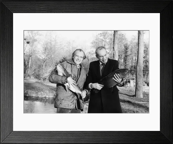 Framed Print : Sam Holland (left), trout farmer with James Pettigrew, hold some of the outsize trout Framed Print : Sam Holland (left), trout farmer with James Pettigrew, hold some of the outsize trout