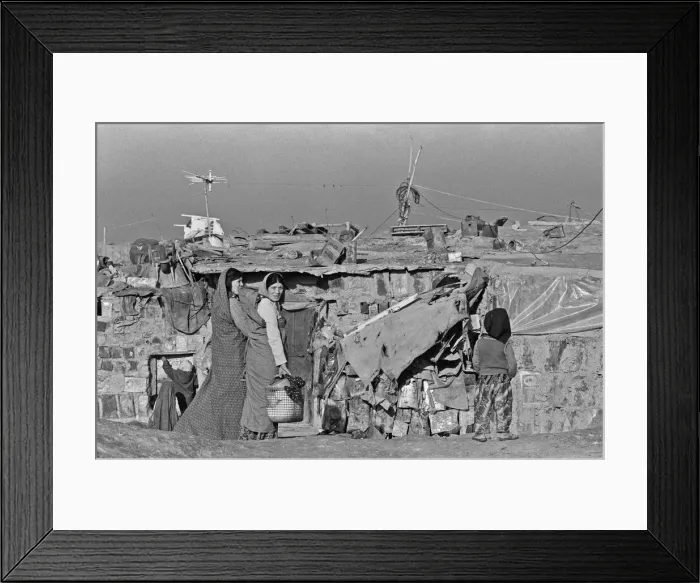 Framed Print : Shanty town on the eastern edge of Tehran, where open sewers run past houses made of mud