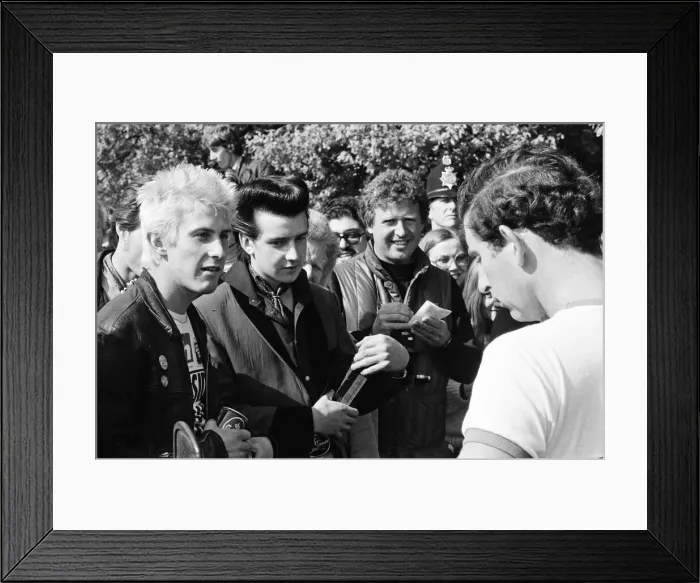 Framed Print : Prince Charles meet Punks during a game of polo. The Punks turned up to the game in Framed Print : Prince Charles meet Punks during a game of polo. The Punks turned up to the game in