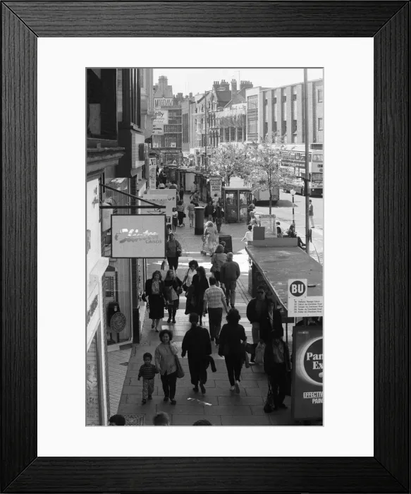 Framed Print : Broad Street is a main pedestrianised thoroughfare and the primary high street in Framed Print : Broad Street is a main pedestrianised thoroughfare and the primary high street in