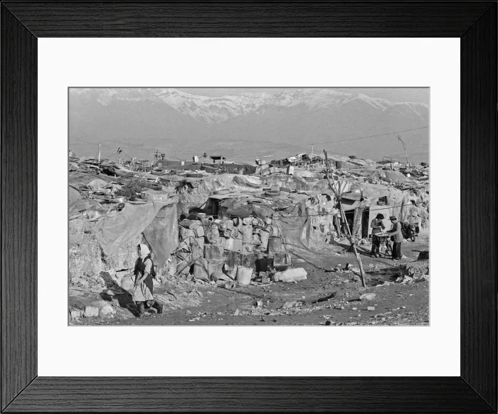 Framed Print : Shanty town on the eastern edge of Tehran, where open sewers run past houses made of mud Framed Print : Shanty town on the eastern edge of Tehran, where open sewers run past houses made of mud