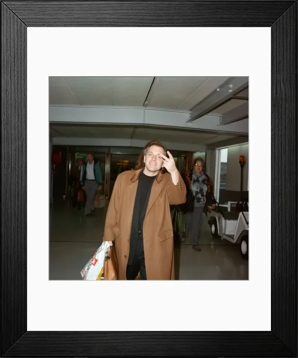 Framed Print : Actor and comedian, Rik Mayall, pictured at London Airport. 29th March 1992 Framed Print : Actor and comedian, Rik Mayall, pictured at London Airport. 29th March 1992