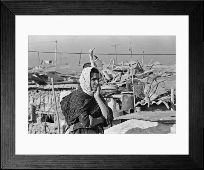 Framed Print : Shanty town on the eastern edge of Tehran, where open sewers run past houses made of mud Framed Print : Shanty town on the eastern edge of Tehran, where open sewers run past houses made of mud