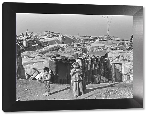 Shanty town on the eastern edge of Tehran, where open sewers run past houses made of mud