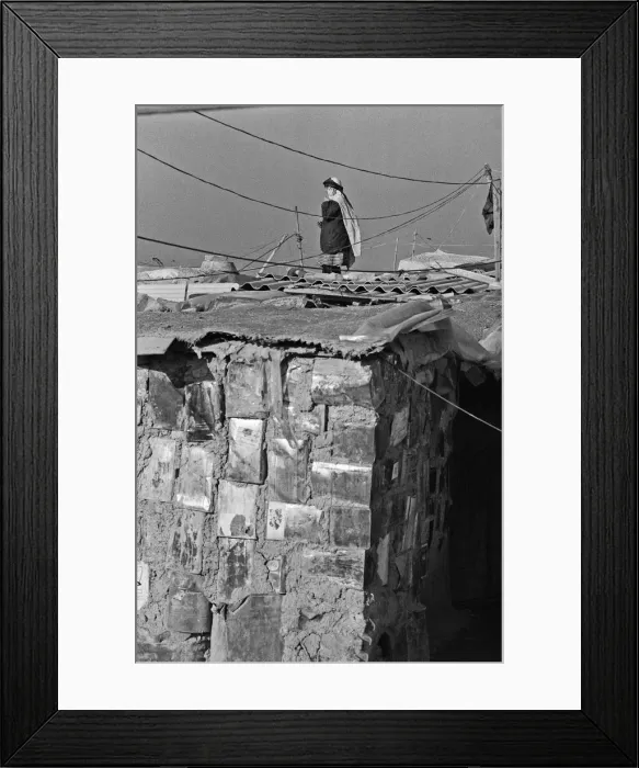 Framed Print : Shanty town on the eastern edge of Tehran, where open sewers run past houses made of mud
