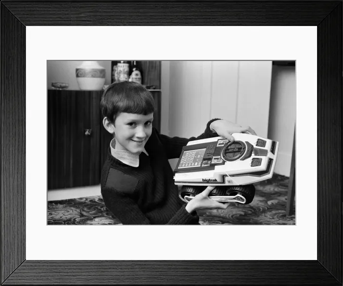 Framed Print : Electronic childrens toys. Pictured, 11 year old Andrew with the Big trak Electronic Framed Print : Electronic childrens toys. Pictured, 11 year old Andrew with the Big trak Electronic