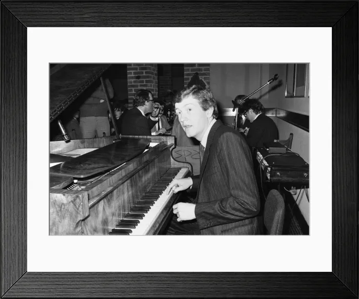 Framed Print : Snooker player Steve Davis playing the piano at a London reception after an announcement Framed Print : Snooker player Steve Davis playing the piano at a London reception after an announcement