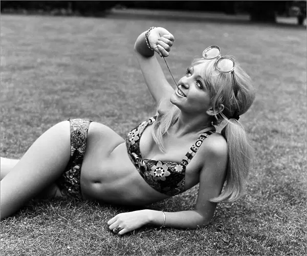 18 year old Karen Kerr wearing a patchwork bikini made by the Womens Institute