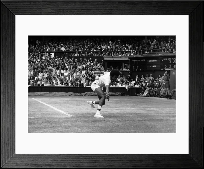 Framed Print : Arthur Ashe playing against Jimmy Connors in the Wimbledon Gentlemens Singles final Framed Print : Arthur Ashe playing against Jimmy Connors in the Wimbledon Gentlemens Singles final