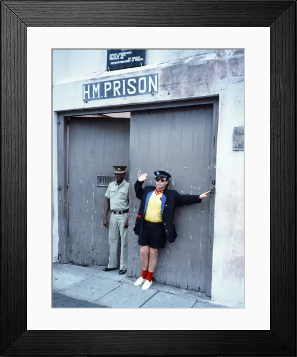 Framed Print : Elton John wearing a Watford F. C. shirt on the Caribbean island of Montserrat