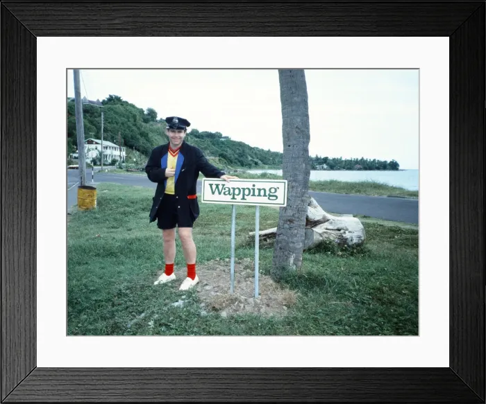 Framed Print : Elton John wearing a Watford F. C. shirt on the Caribbean island of Montserrat Framed Print : Elton John wearing a Watford F. C. shirt on the Caribbean island of Montserrat