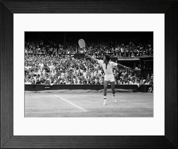 Framed Print : Arthur Ashe playing against Jimmy Connors in the Wimbledon Gentlemens Singles final Framed Print : Arthur Ashe playing against Jimmy Connors in the Wimbledon Gentlemens Singles final