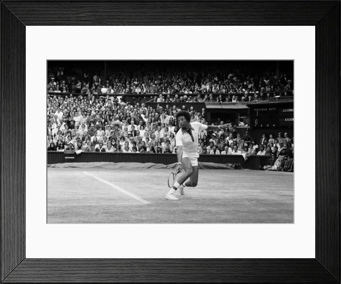 Framed Print : Arthur Ashe playing against Jimmy Connors in the Wimbledon Gentlemens Singles final Framed Print : Arthur Ashe playing against Jimmy Connors in the Wimbledon Gentlemens Singles final