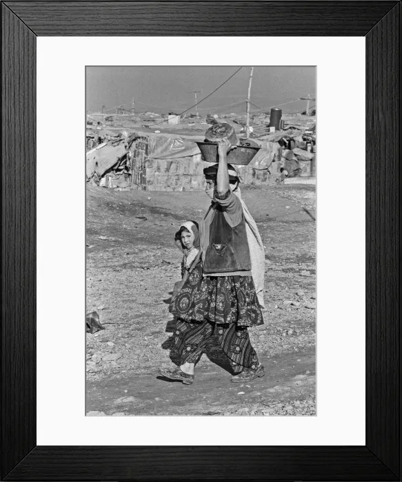 Framed Print : Shanty town on the eastern edge of Tehran, where open sewers run past houses made of mud Framed Print : Shanty town on the eastern edge of Tehran, where open sewers run past houses made of mud
