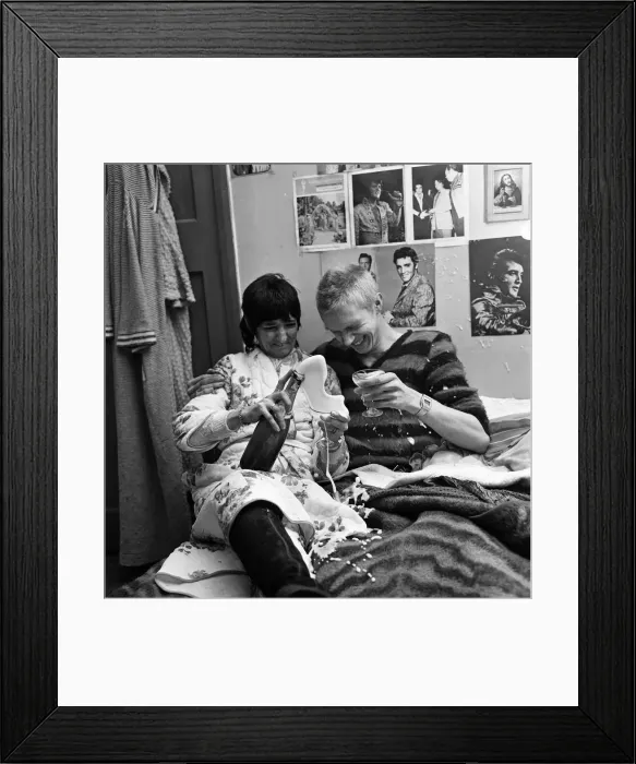 Framed Print : Newlywed punk rockers Helga (aged 45) and Adrian (17) Marsden at home in Ward Green