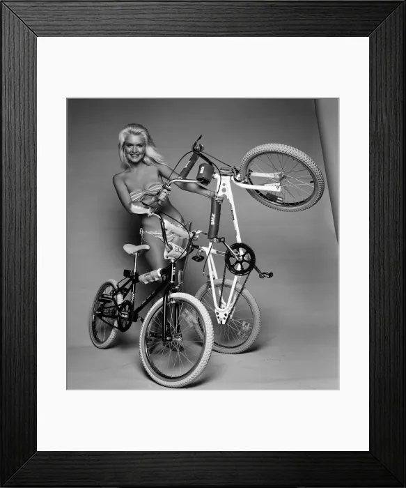 Framed Print : A model with two BMX bicycles. August 1984 Framed Print : A model with two BMX bicycles. August 1984