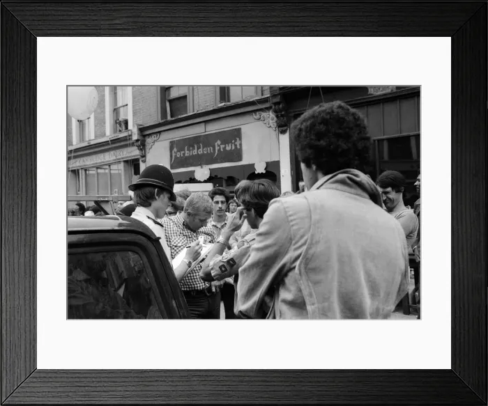 Framed Print : Notting Hill Carnival. The police check point for people who have had wallets, bags etc
