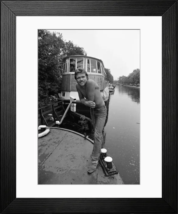 Framed Print : Richard Branson aboard his houseboat  /  office at Maida Vale, London. 31st July 1982