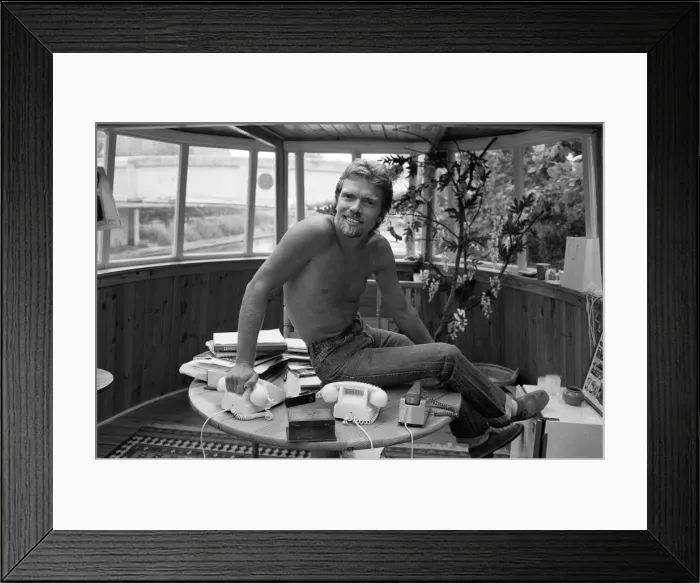 Framed Print : Richard Branson aboard his houseboat / office at Maida Vale, London. 31st July 1982 Framed Print : Richard Branson aboard his houseboat / office at Maida Vale, London. 31st July 1982