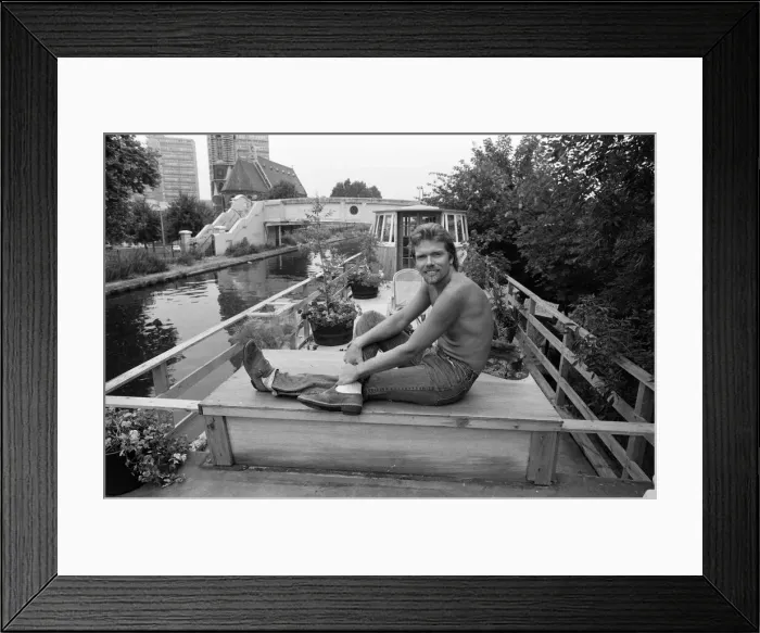 Framed Print : Richard Branson aboard his houseboat  /  office at Maida Vale, London. 31st July 1982