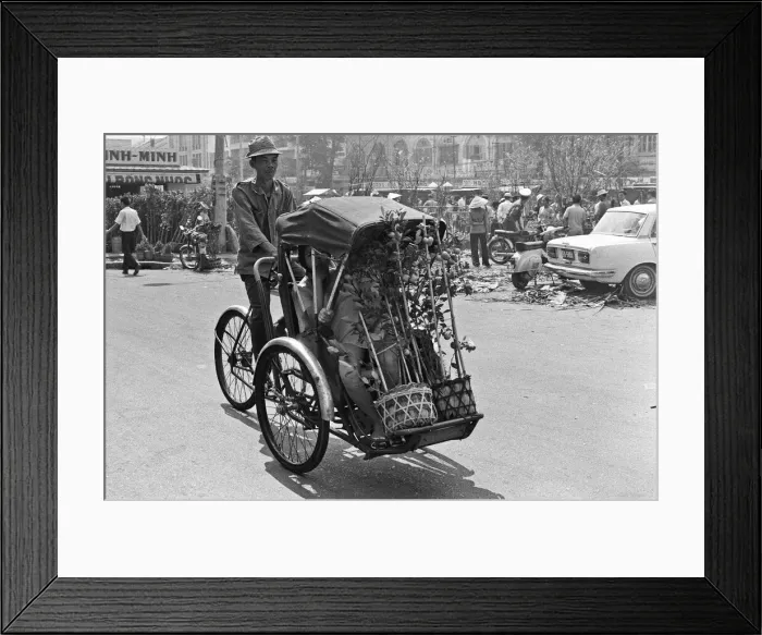 Framed Print : As Tet the Vietnamese New Year gets closer, it seems that the whole population of Saigon Framed Print : As Tet the Vietnamese New Year gets closer, it seems that the whole population of Saigon
