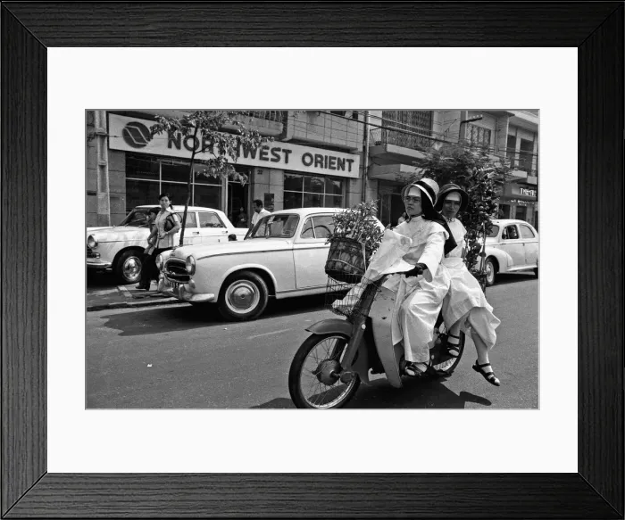 Framed Print : As Tet the Vietnamese New Year gets closer, it seems that the whole population of Saigon Framed Print : As Tet the Vietnamese New Year gets closer, it seems that the whole population of Saigon