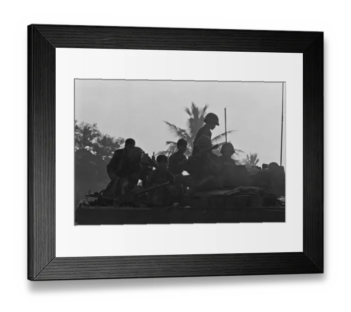 Framed Print : Soldiers of the South Vietnamese army watch from the top of an armoured personnel carrier
