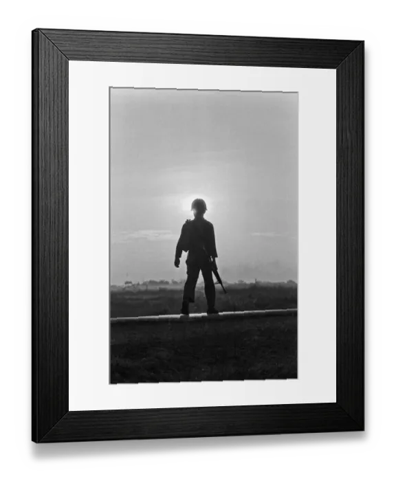 Framed Print : A soldier of the South Vietnamese army advances on Viet Cong positions in Trang Bang just Framed Print : A soldier of the South Vietnamese army advances on Viet Cong positions in Trang Bang just