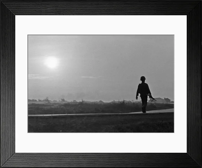 Framed Print : A soldier of the South Vietnamese army advances on Viet Cong positions in Trang Bang just Framed Print : A soldier of the South Vietnamese army advances on Viet Cong positions in Trang Bang just