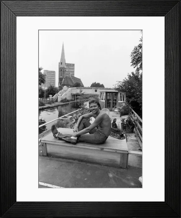 Framed Print : Richard Branson aboard his houseboat / office at Maida Vale, London. 31st July 1982 Framed Print : Richard Branson aboard his houseboat / office at Maida Vale, London. 31st July 1982