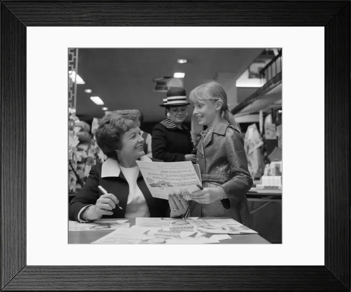 Framed Print : Phyllis Calvert, English film, stage and television actress signing copies of her new LP Framed Print : Phyllis Calvert, English film, stage and television actress signing copies of her new LP