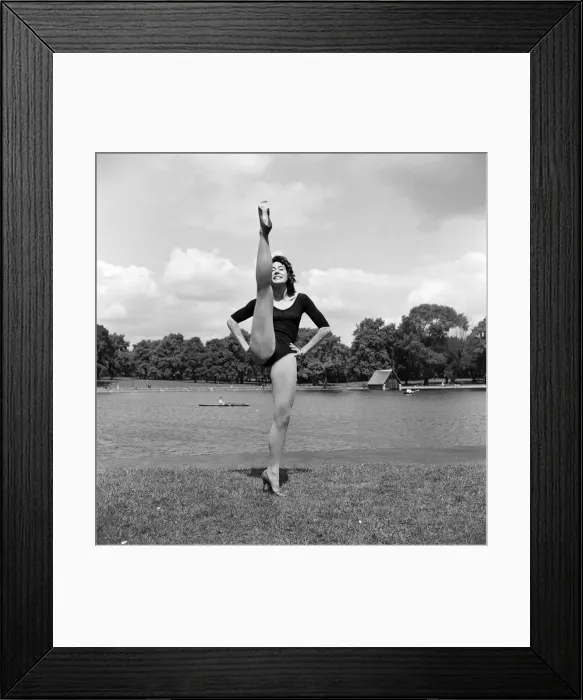Framed Print : Dancer Gillian Lynne has her own idea of a sitting position whilst taking the sun Framed Print : Dancer Gillian Lynne has her own idea of a sitting position whilst taking the sun