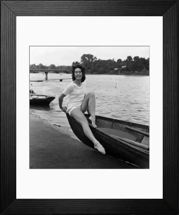 Framed Print : Dancer Gillian Lynne has her own idea of a sitting position whilst taking the sun Framed Print : Dancer Gillian Lynne has her own idea of a sitting position whilst taking the sun